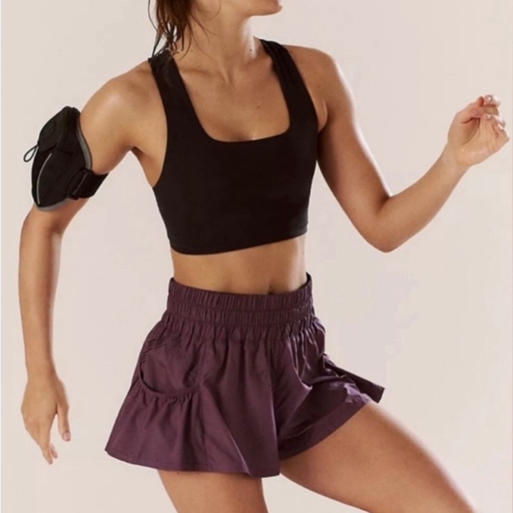 NWOT FREE PEOPLE Movement get your flirt on tee shorts sized medium in plum